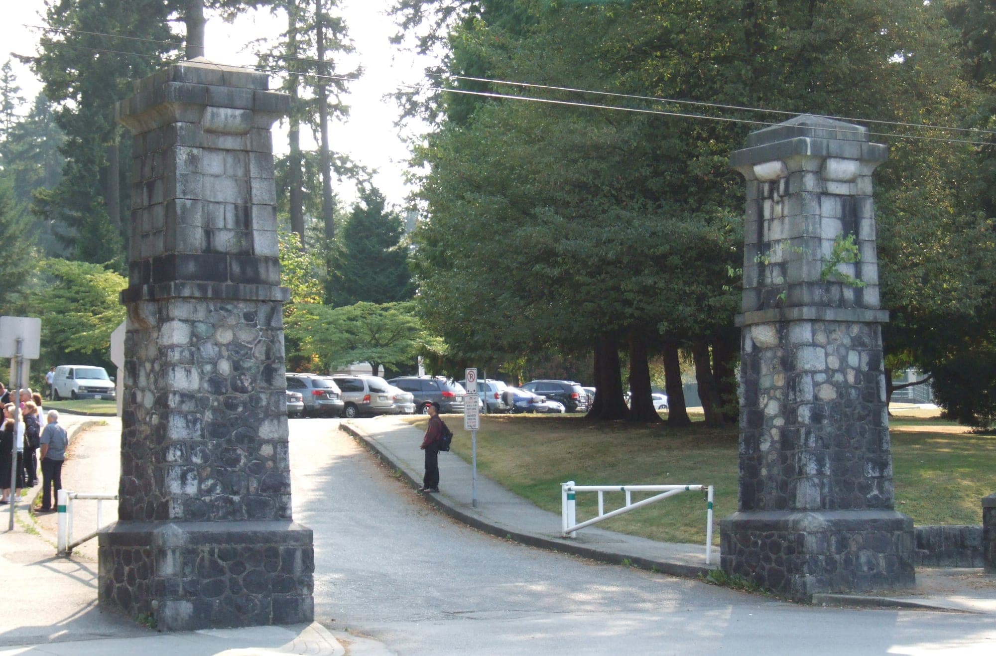 Stone gateway at one of the entrances to Central Park in Burnaby, marked with the park's name carved into the stone arch.