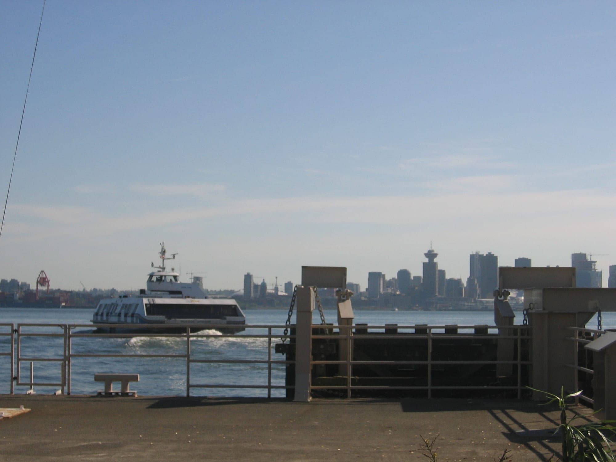 A SeaBus departing Lonsdale Quay in Lower Lonsdale, North Vancouver, heading across Burrard Inlet to downtown Vancouver.