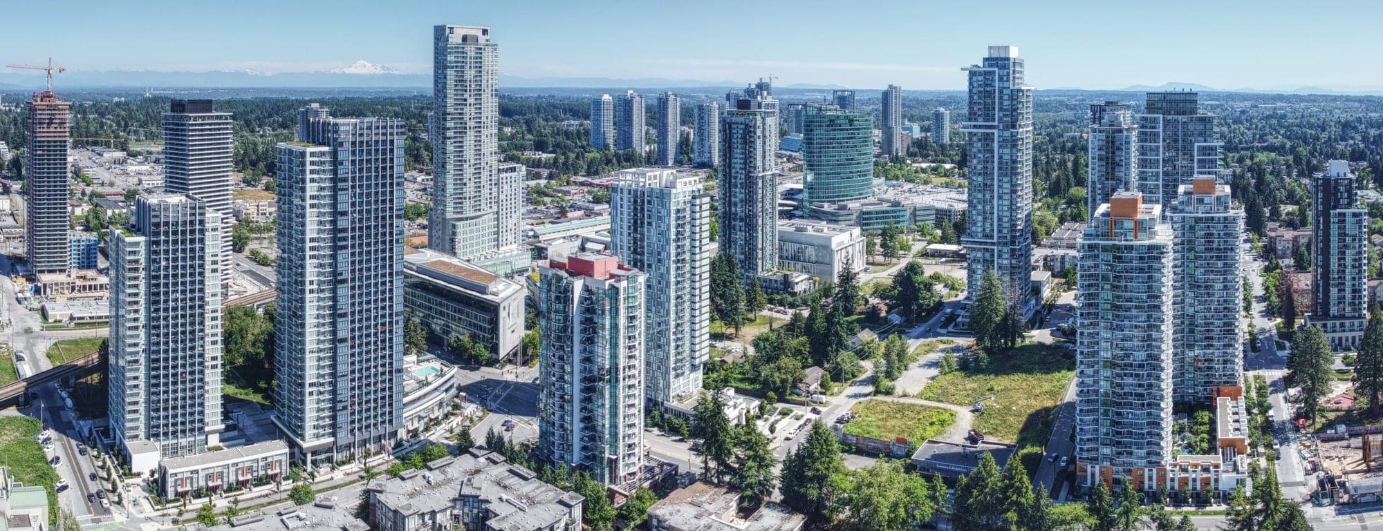 Surrey City Centre skyline in 2025, showing the new residential and commercial high-rises of downtown Surrey surrounding the SkyTrain corridor.